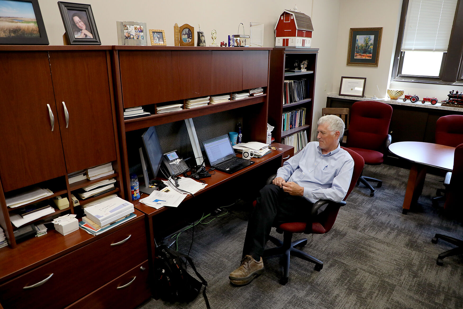 Patrick Westhoff sits inside of his office